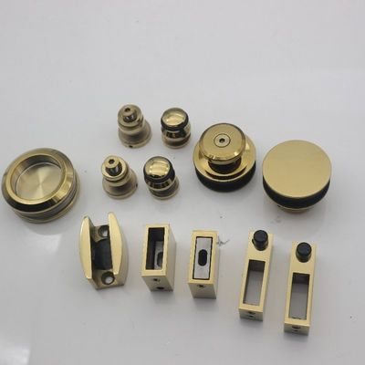 Système de porte coulissante SS304 sans cadre avec rouleaux en or polonais et style de conception sans cadre